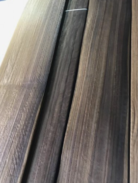 How can smoked wood veneer, which makes veneers keep their distance, avoid cracking when pasted by hand?